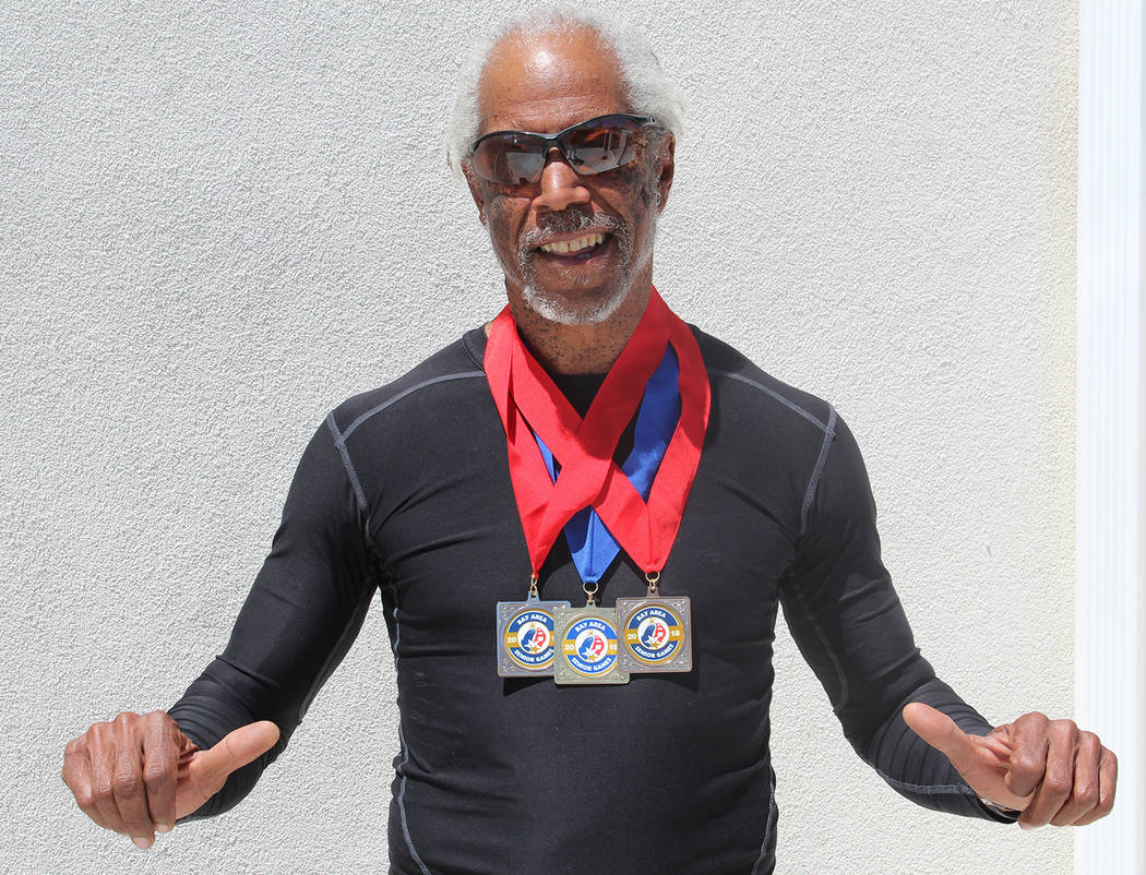 Tom Rysinski/Pahrump Valley Times Marvin Caperton of Pahrump shows off the one gold and two silver medals he won May 27 at the Bay Area Senior Games in San Mateo, California.