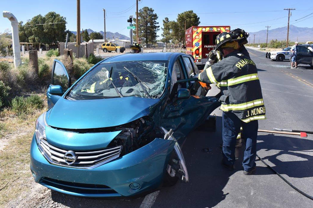 Special to the Pahrump Valley Times Fire crews were forced to perform a door removal to free an entrapped driver after a two-vehicle crash along North Blagg Road at Irene Street on Friday May 25. ...