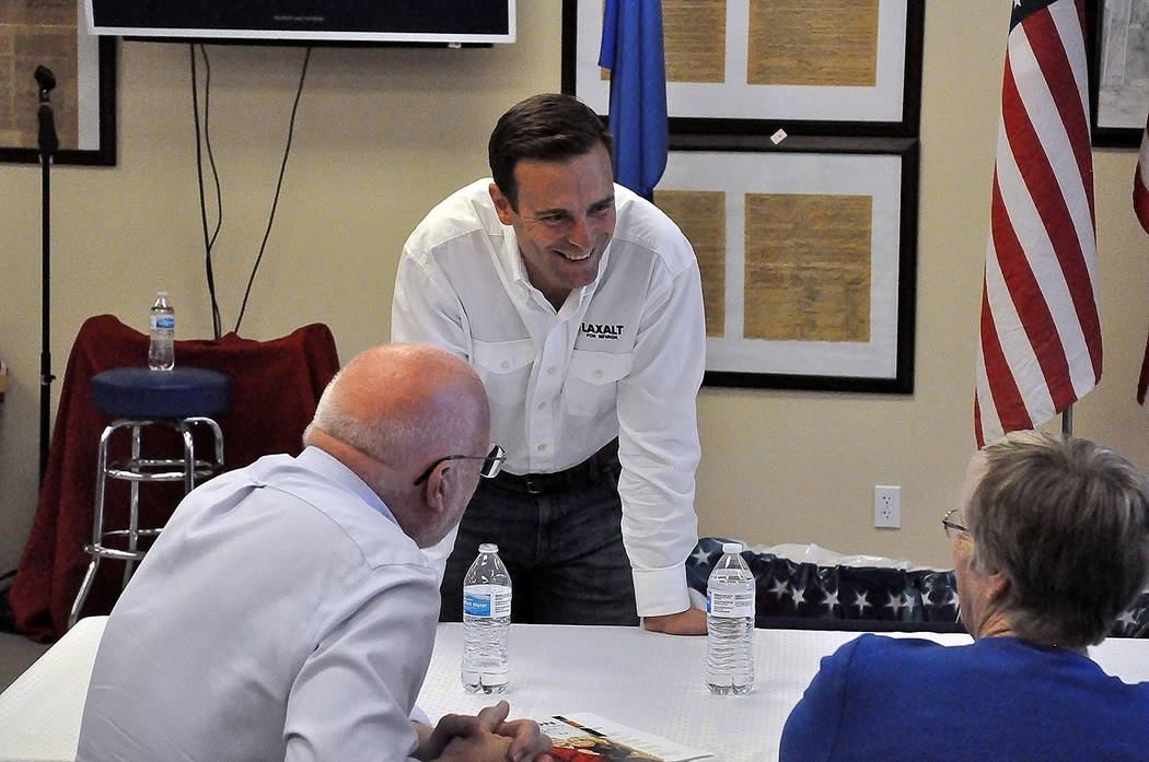 Horace Langford Jr./Pahrump Valley Times - Republican contender for Nevada Governor, Adam Laxalt is pictured discussing topics of interest with Pahrump Valley residents.