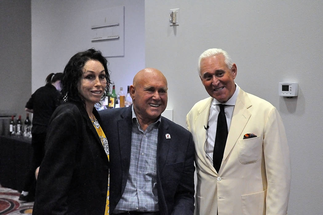 Horace Langford Jr./Pahrump Valley Times Heidi Fleiss (left) stands next to Dennis Hof (center) and Roger Stone (right), longtime confidant of President Donald Trump at a campaign rally for Hof on ...