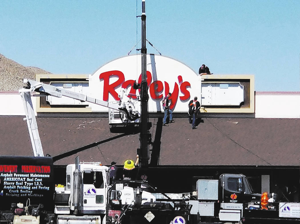 Nancy Whipperman/Pahrump Valley Times The new Raley's sign going up on Tonopah's only grocery store on June 8, 2018. West Sacramento-based Raley's, which purchased the once Scolari's Food & Drug C ...