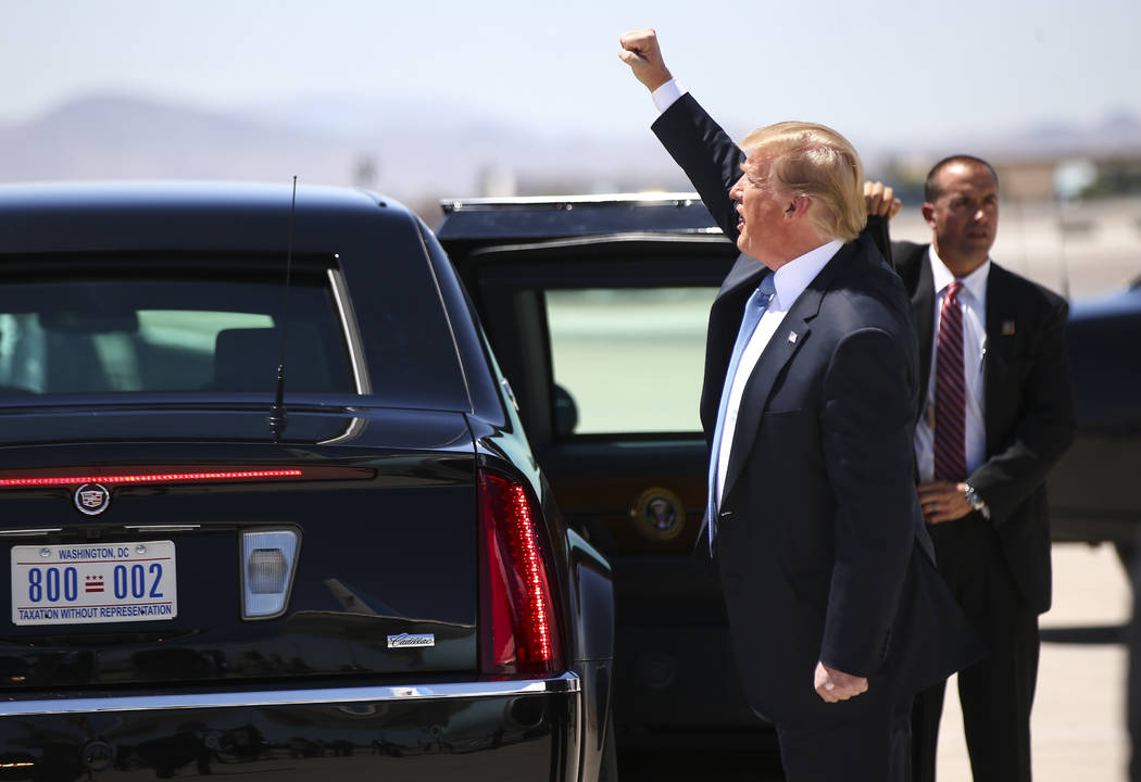 President Donald Trump acknowledges supporters after arriving at McCarran International Airport in Las Vegas on Saturday, June 23, 2018. Chase Stevens Las Vegas Review-Journal @csstevensphoto