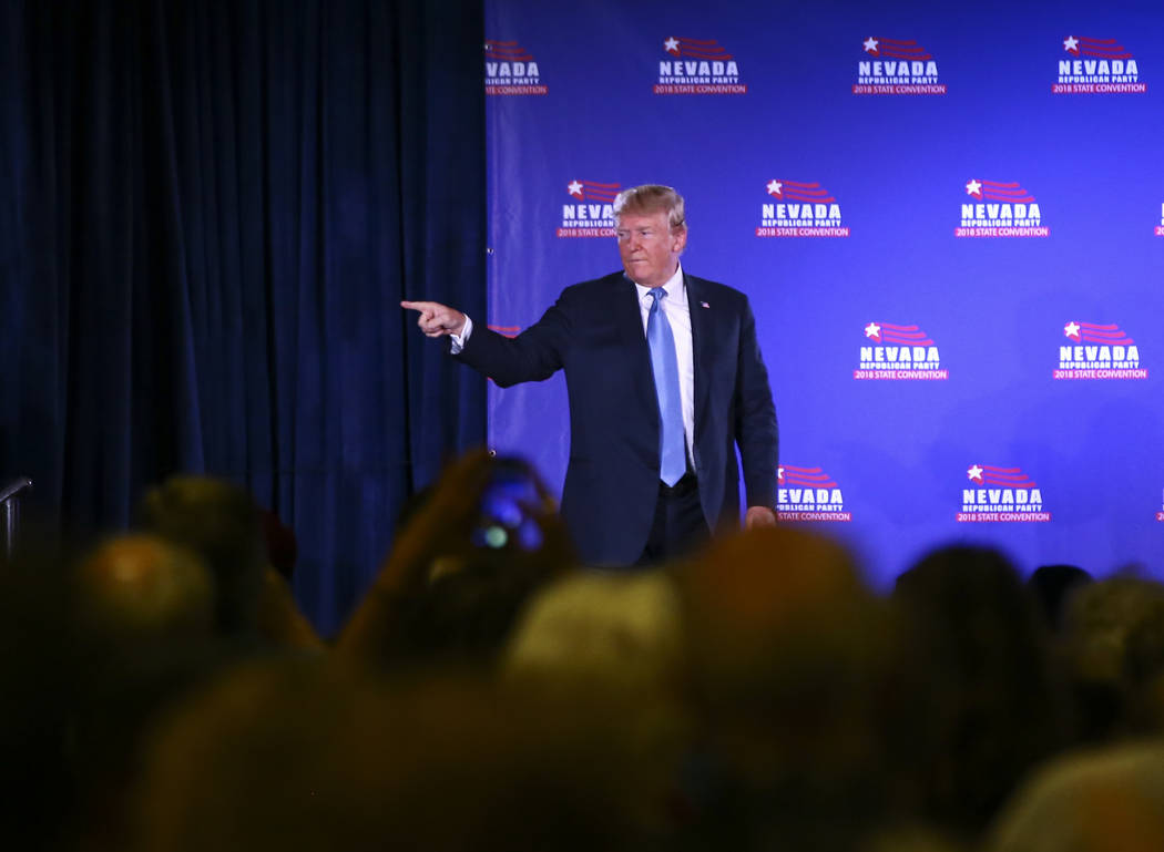 President Donald Trump acknowledges supporters after giving the keynote address at the Nevada Republican Party State Convention at the Suncoast in Las Vegas on Saturday, June 23, 2018. Chase Stev ...