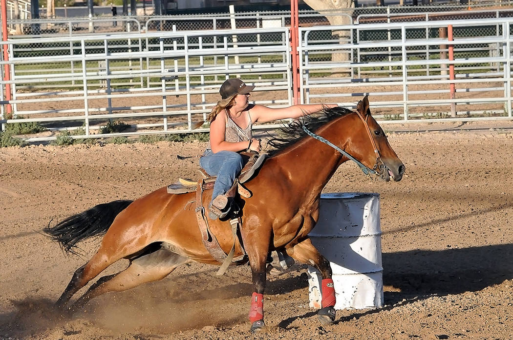 Horace Langford Jr./Pahrump Valley Times Felicity Buesig competes in barrel racing during the Pahrump Valley Rough Riders show June 16 at McCullough Arena in Pahrump.