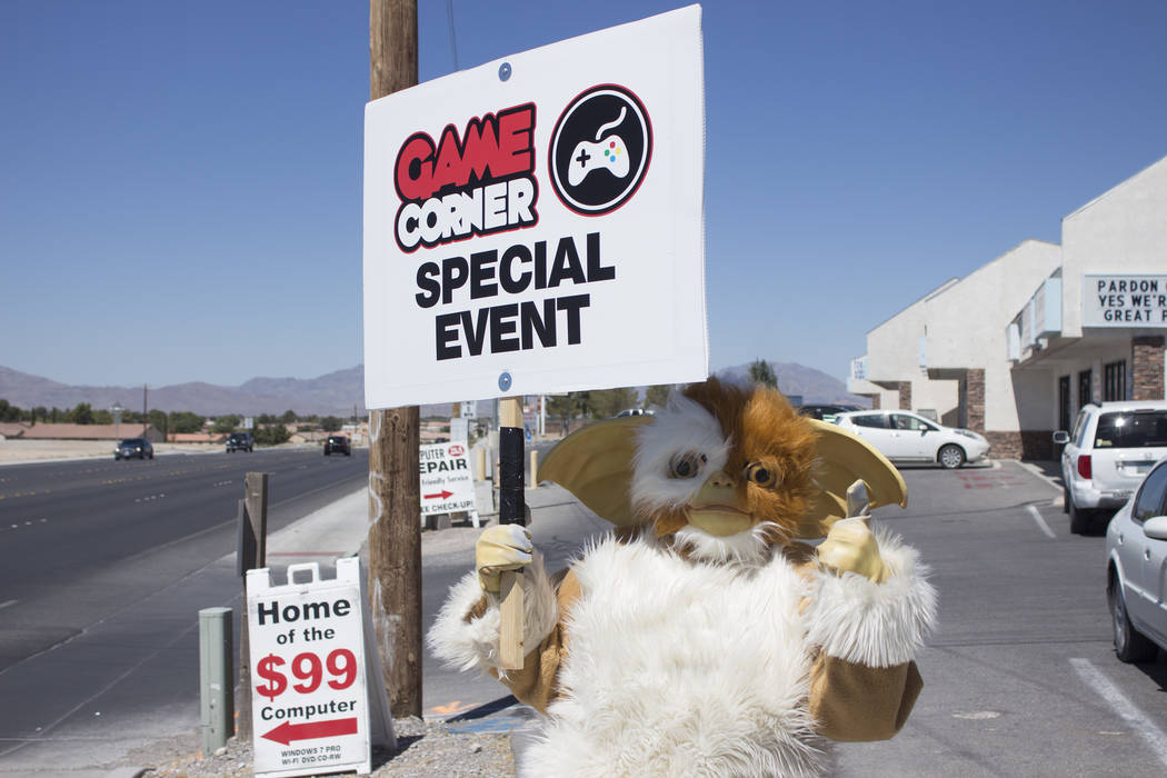 Jeffrey Meehan/Pahrump Valley Times Game Corner, which carries hundreds of video game titles, game systems and other things such as collectibles, had a few friends visits during a grand opening ce ...