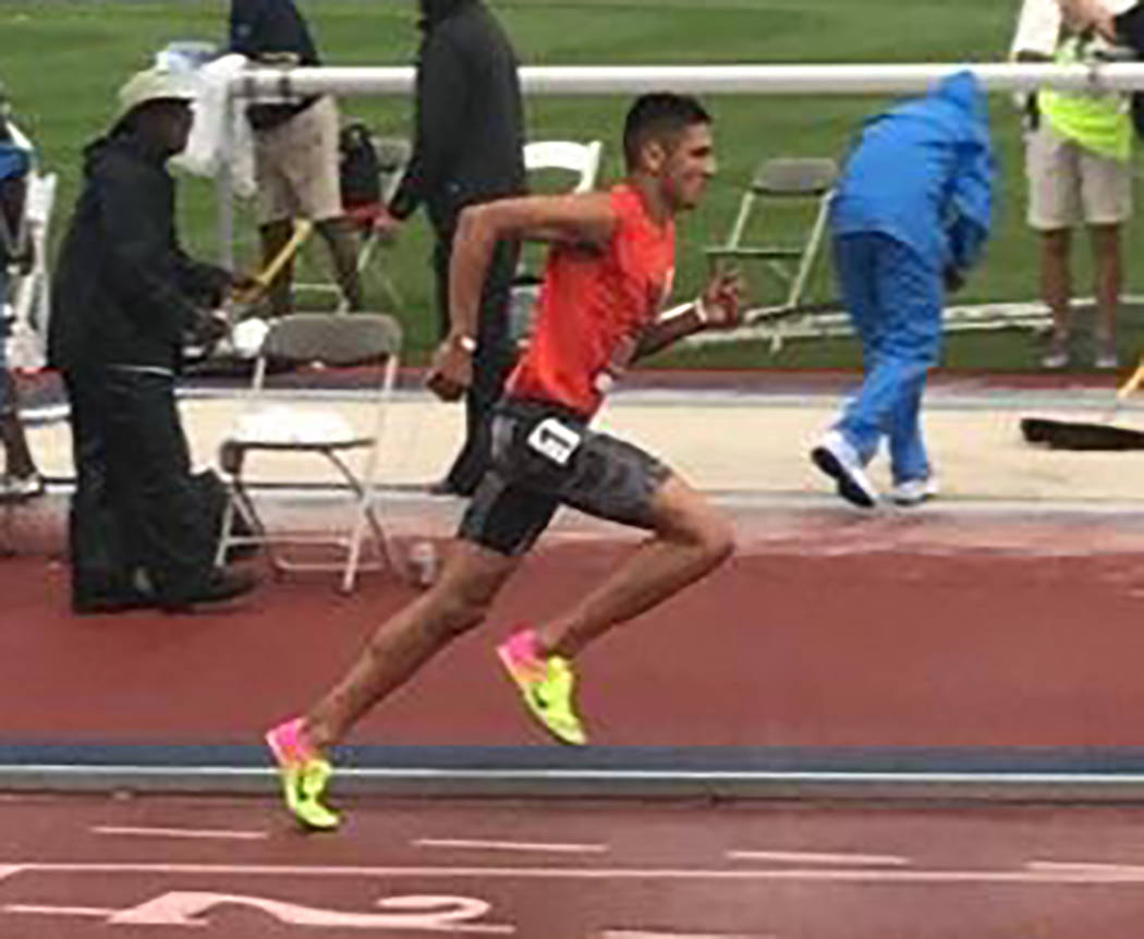 Special to the Pahrump Valley Times Jose Granados of Beatty High School and the Vegas Valley Track Club competes in the 1,500 meters at the USA Track and Field Hershey National Junior Olympics Cha ...