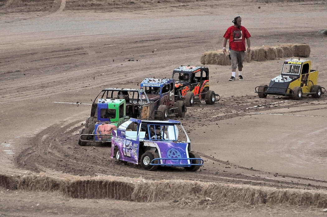 Horace Langford Jr./Pahrump Valley Times Addy Murphy, driving Thunder Girl, leads the pack during Southern Nevada Mini Dwarf racing Saturday night at Pahrump Valley Speedway. Murphy finished secon ...