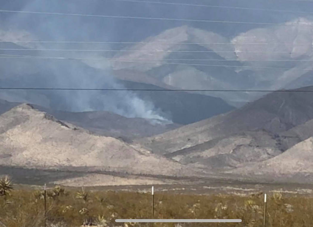Jessica Reid/Special to the Pahrump Valley Times The 10 acre Crystal Spring Fire, which was 75 percent contained as of Monday afternoon, is burning along the pinyon-juniper woodlands in the Mount ...