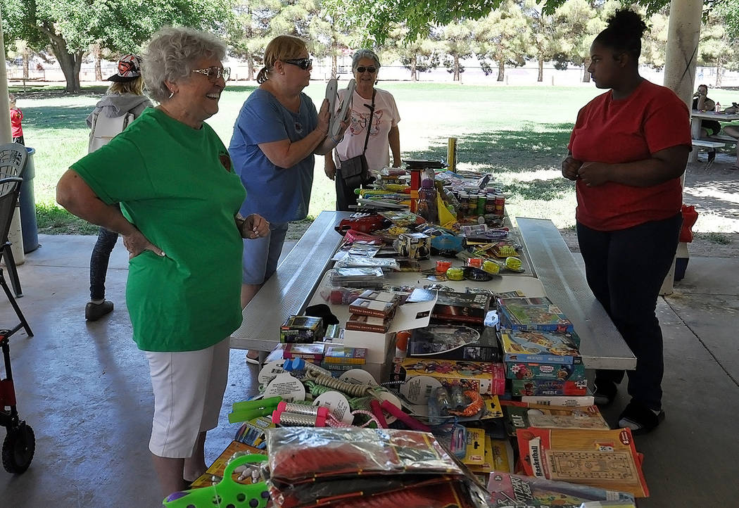 Horace Langford Jr./Pahrump Valley Times - The Smiles Across Pahrump prize table was filled with goodies, all donated and given away to local children as prizes for winning games and activities.