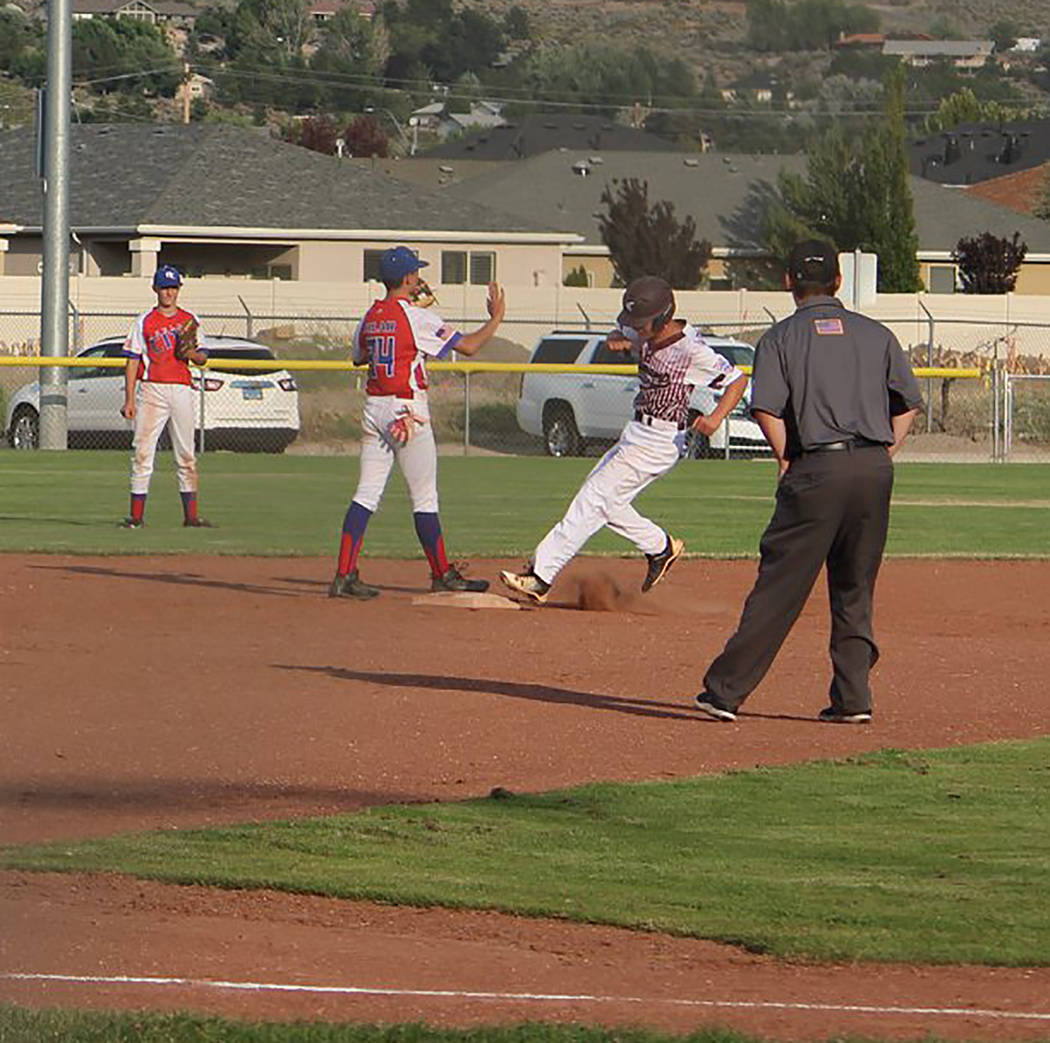 Caroline Thacker/Special to the Pahrump Valley Times Louis Sposato pulls into second base with one of his three doubles against Boulder City during the P-Town Little League Junior All-Stars' 8-7 l ...