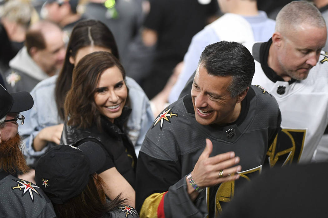 Gov. Brian Sandoval and fiancee Lauralyn McCarthy are greeted during a Golden Knights playoff game on Friday, April 13, 2018, at T-Mobile Arena in Las Vegas. (Sam Morris/Las Vegas News Bureau)