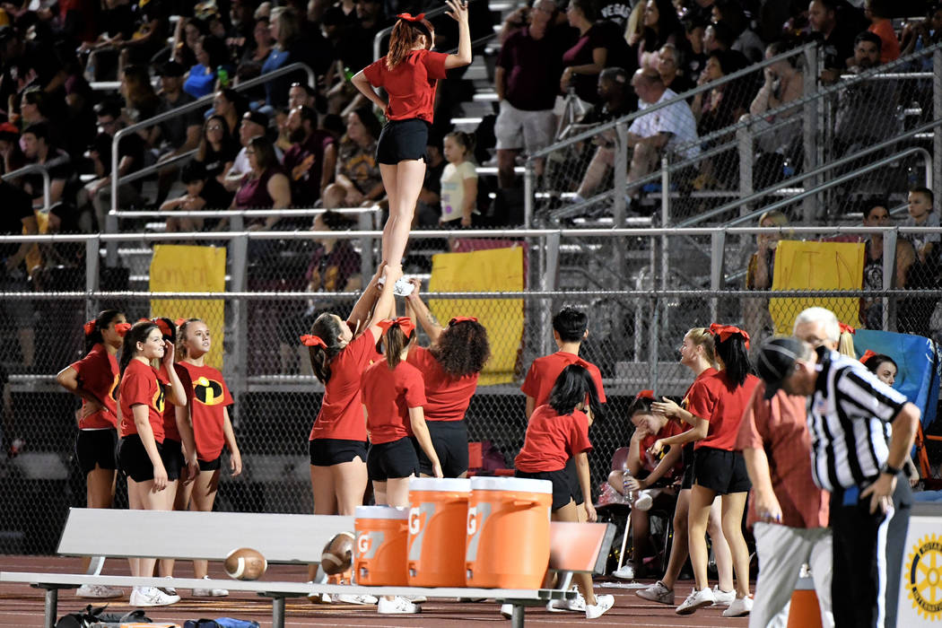 Peter Davis/Special to the Pahrump Valley Times The Pahrump Valley cheer team worked to keep the homecoming crowd in the game as the Trojans rolled to an easy 42-14 win.