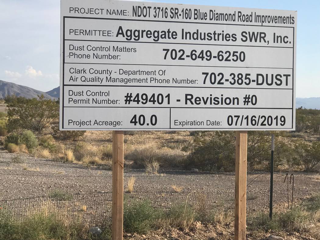 Jeffrey Meehan/Pahrump Valley Times A sign sits along the south side of Highway 160 just west of Mountain Springs on Aug. 20, 2018. Aggregate Industries SWR was awarded a roughly $59 million contr ...