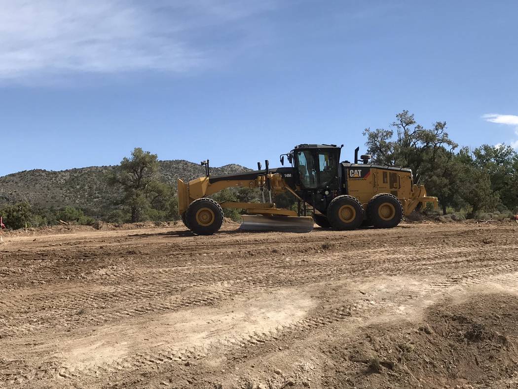 Jeffrey Meehan/Pahrump Valley Times Crews work along Highway 160 in the Mountain Springs area on Sept. 5, 2018. The road is being widened from two to four lanes, among other work.