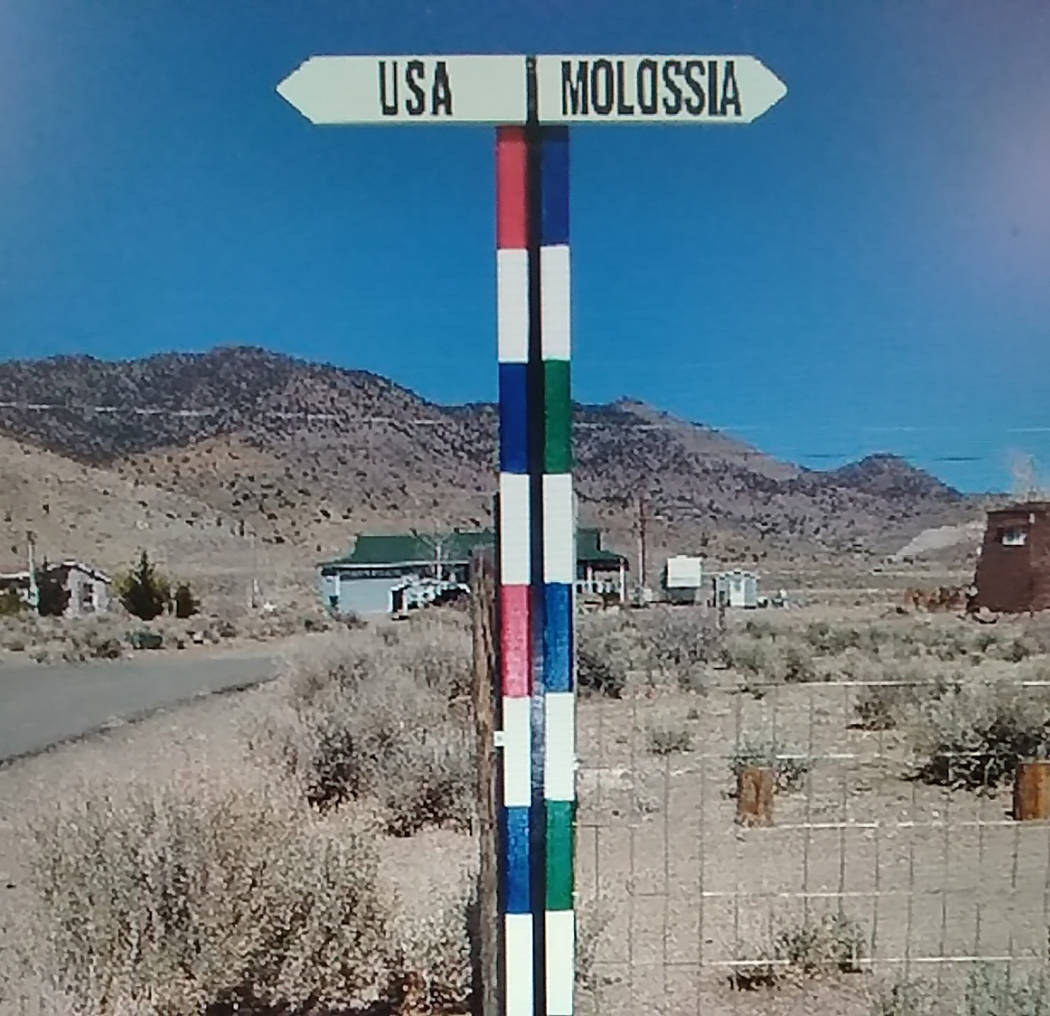 Special to the Pahrump Valley Times A border sign points to the Republic of Molossia, a self-de ...