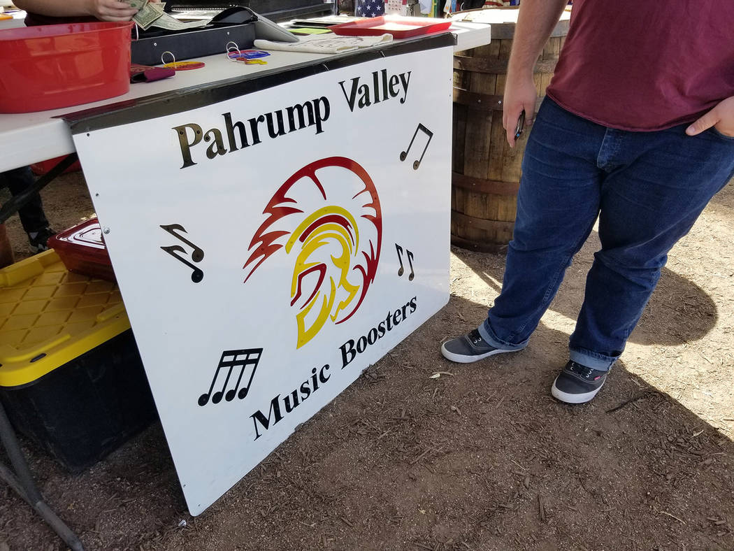 David Jacobs/Pahrump Valley Times The Pahrump Valley High School Booster Club's booth is shown at the Pahrump Fall Festival, which concluded on Sunday. Funds are being raised to send the band to H ...