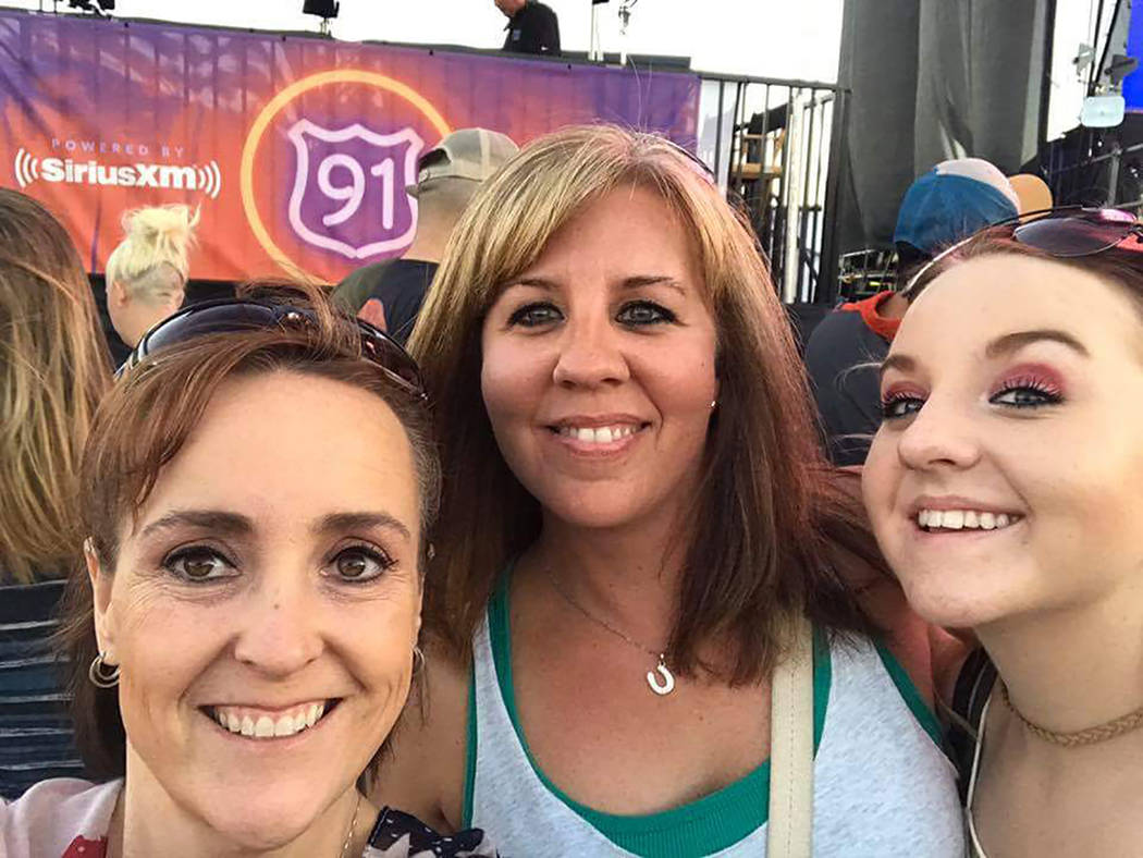 Special to the Pahrump Valley Times Pahrump resident Denise Koch, center, takes part in a selfie at the Route 91 Country Music Festival last year. Koch is join by her daughter Breana, at right, an ...