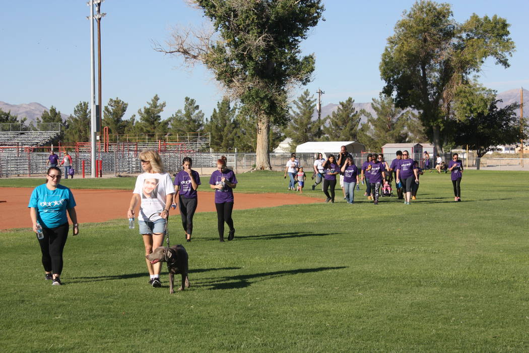 Robin Hebrock/Pahrump Valley Times Purple and teal were worn by many an attendee of the 2018 Walk In Memory, Walk For Hope event, hosted September 15 at Petrack Park. Others wore specially made T- ...