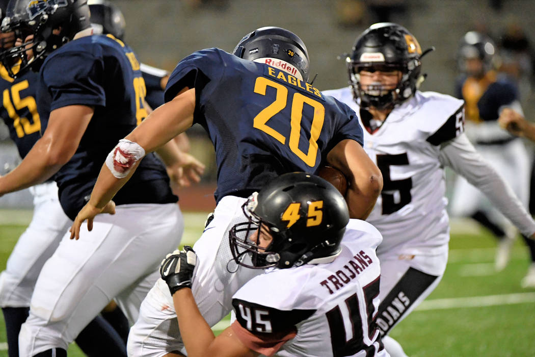 Peter Davis/Special to the Pahrump Valley Times Pahrump Valley senior Tristan Maughan, shown tackling Boulder City's Thorsten Ballmer earlier this season, had the first of four sacks against Del S ...