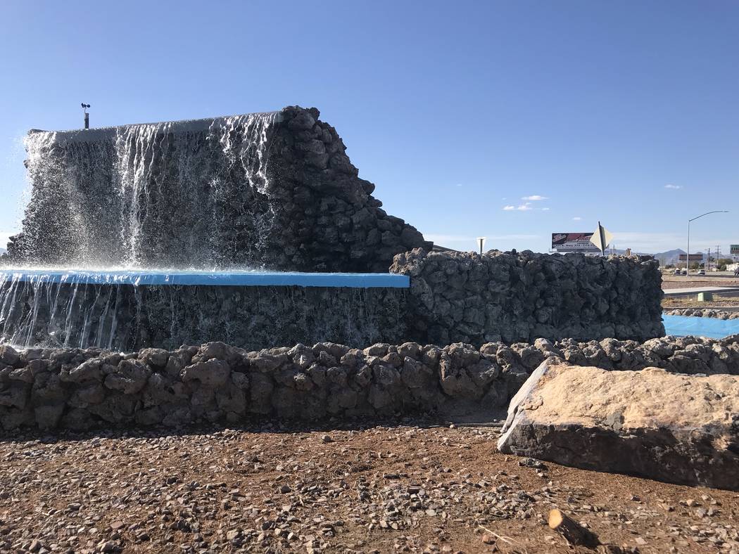 Jeffrey Meehan/Pahrump Valley Times Water flows from the fountain at Calvada Boulevard and Highway 160 on Wednesday after a long absence. Nye County officials stated the project is still in the te ...