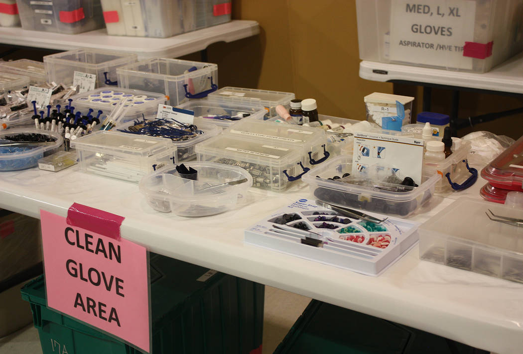 Robin Hebrock/Pahrump Valley Times The dental station set up inside the NyE Communities Coalition Activities Center was filled with all of the tools and items volunteers needed to clean, fill and ...