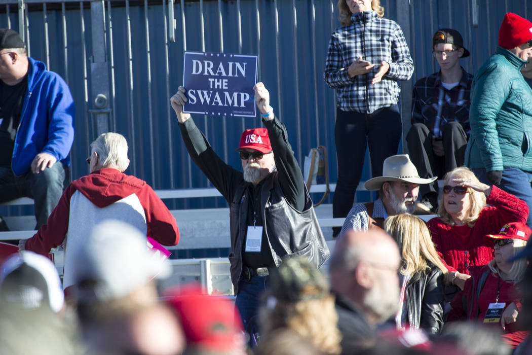 A supporter of President Donald Trump waves his sign during a Make America Great Again Rally in Elko, Nev., on Saturday, Oct. 20, 2018. Richard Brian Las Vegas Review-Journal @vegasphotograph
