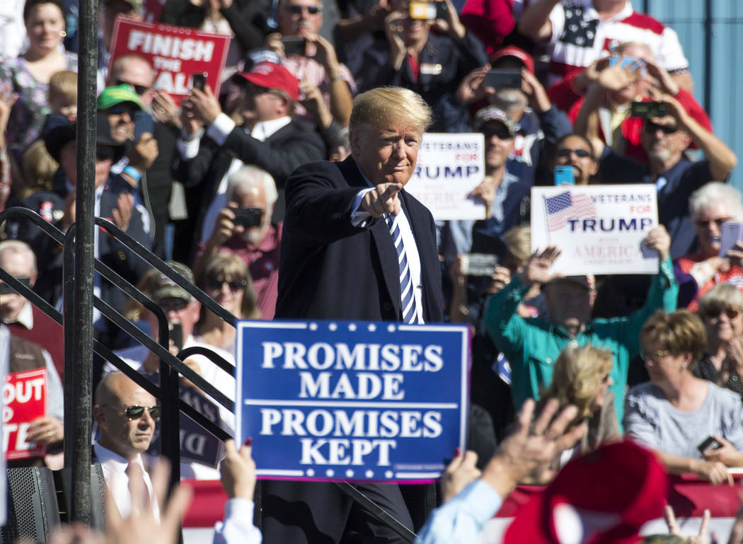 President Donald Trump points to the crowd following a Make America Great Again Rally in Elko, Nev., on Saturday, Oct. 20, 2018. Richard Brian Las Vegas Review-Journal @vegasphotograph