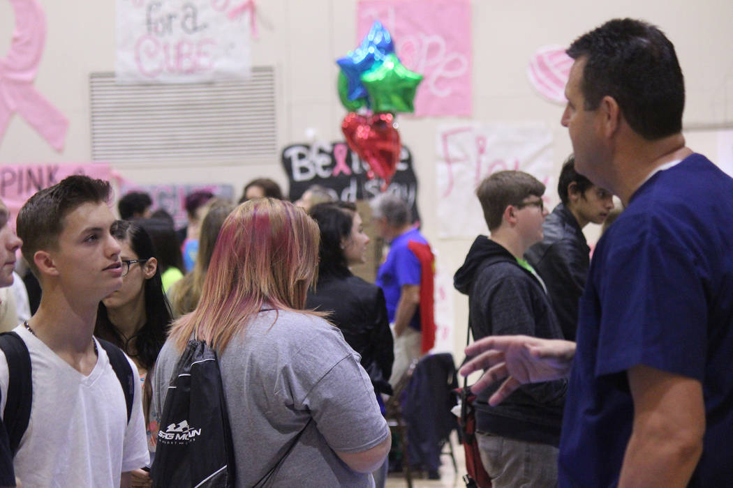 Jeffrey Meehan/Pahrump Valley Times Dozens of students from across Nye County swept through Pahrump Valley High School's gymnasium this fall for the annual college and career fair. Several area em ...