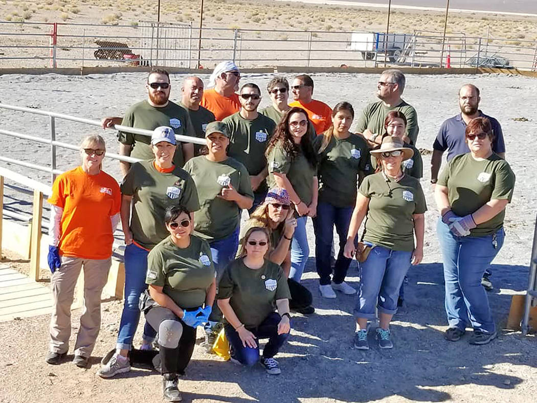 Special to the Pahrump Valley Times Home Depot work crews and Freedom Reins Ranch members gather for a group photo at the ranch to celebrate the improvements made through a grant from the Home Dep ...