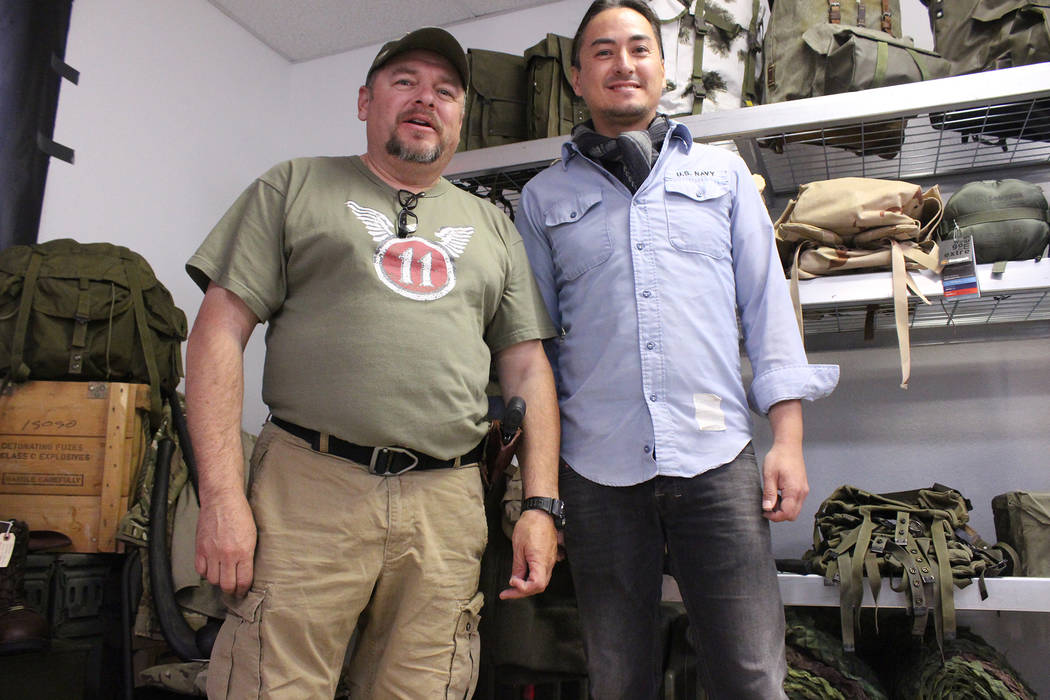 Jeffrey Meehan/Pahrump Valley Times Edward Ledesma (left) stands with his business partner Mitchell Langon at their future shop: Desert Nomad Tactical and Survival. The shop will carry a variety o ...