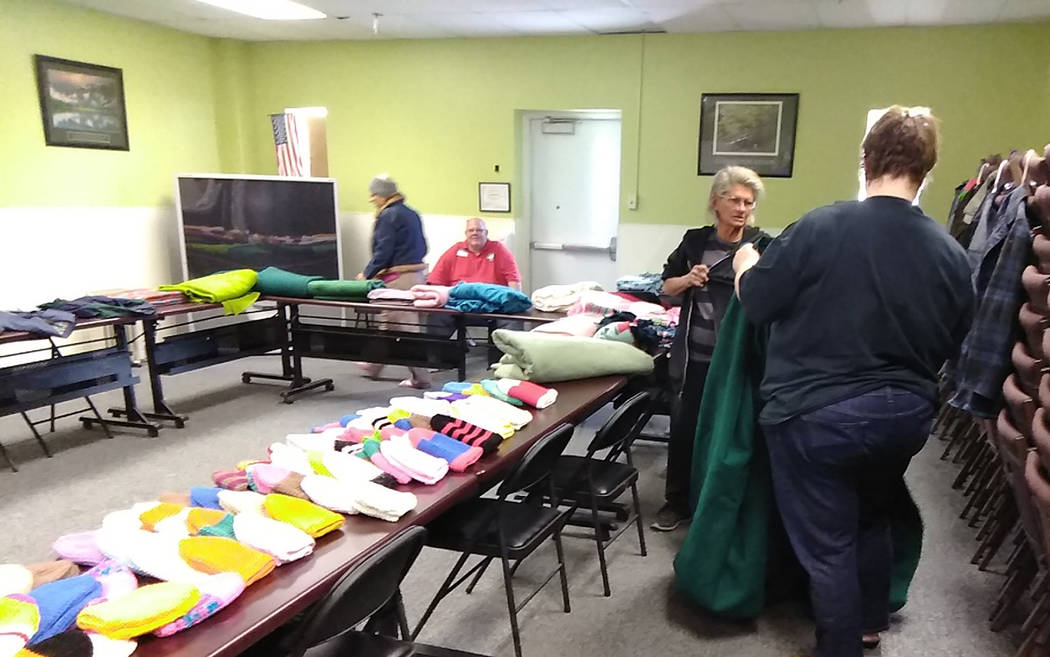 Selwyn Harris/Pahrump Valley Times Aside from a free Thanksgiving dinner, coalition officials offered all attendees new winter clothing and accessories, also free of charge.