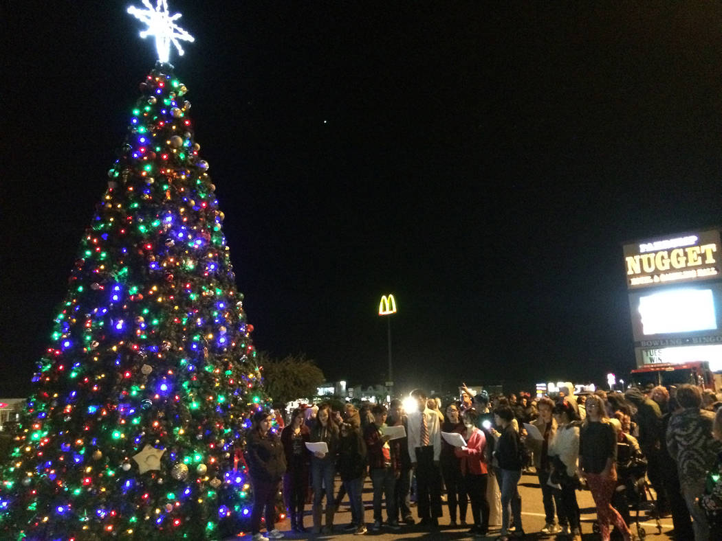 Robin Hebrock/Pahrump Valley Times The Pahrump Nugget parking lot is now adorned with the Community Christmas Tree, which will continue to light up the night until after the calendars turn to a ne ...