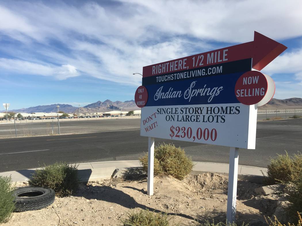 A sign for homebuilder Touchstone Living's project in Indian Springs is seen Tuesday, Nov. 20, 2018, across the highway from Creech Air Force Base. (Eli Segall/Las Vegas Review-Journal)