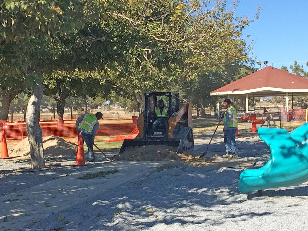 Robin Hebrock/Pahrump Valley Times Workers are pictured laboring at Ian Deutch Memorial Park, where the playground was closed from Nov. 13 to Nov. 28. The prep work was performed to ready the park ...