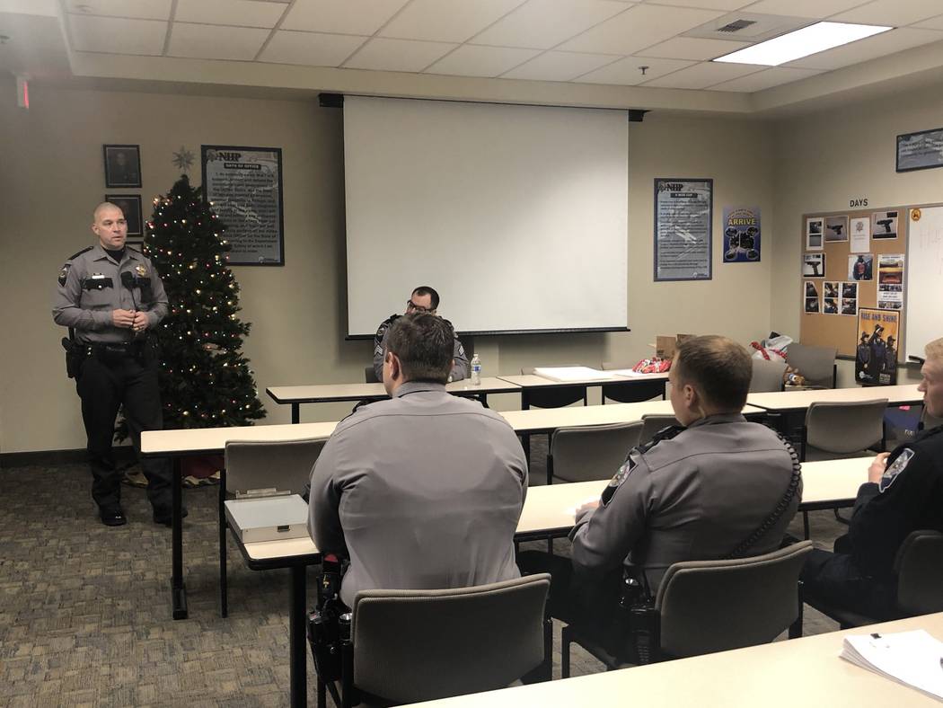 Nevada Highway Patrol Lt. Anthony Munoz at the patrol's southern command graveyard shift briefing late Friday, November 31, 2018. Munoz introduced troopers to this year's Life Saving Tree, a Chris ...
