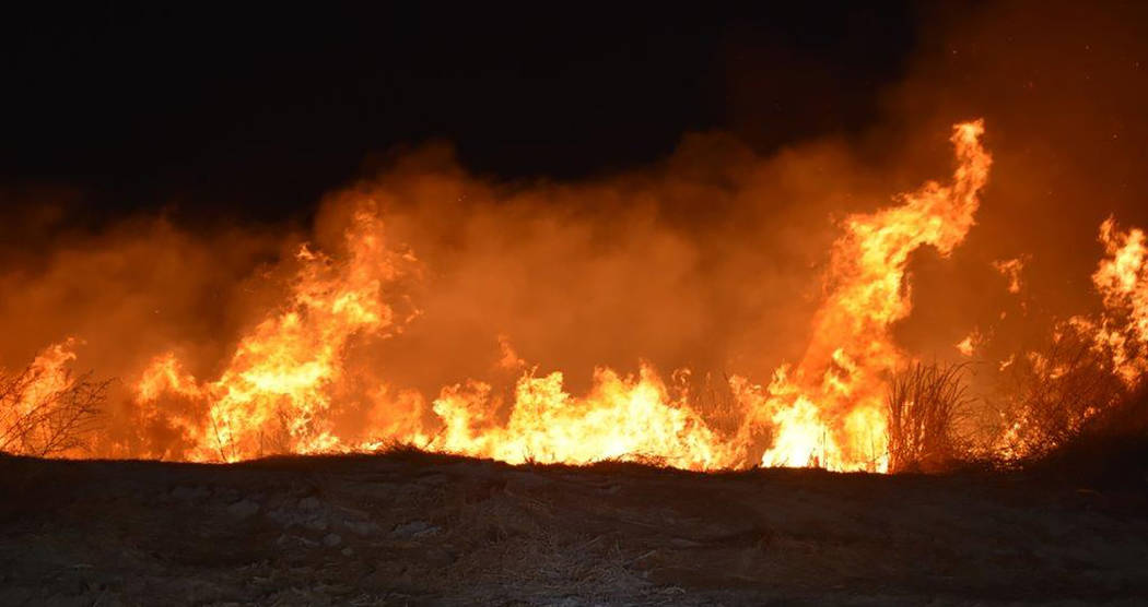 Special to the Pahrump Valley Times Pahrump fire crews were dispatched to the area of Gamebird Road and Malibou Street early Friday morning December 28, for a reported wind swept brush fire just b ...