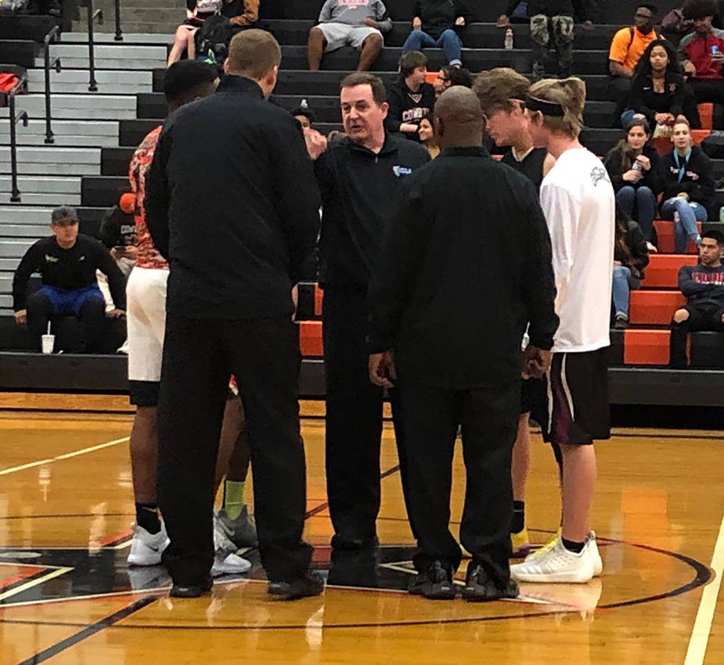 Tom Rysinski/Pahrump Valley Times Captains Brayden Severt and Grant Odegard and Chaparral's captains meet with the officials before Tuesday night's game against Chaparral in Las Vegas.