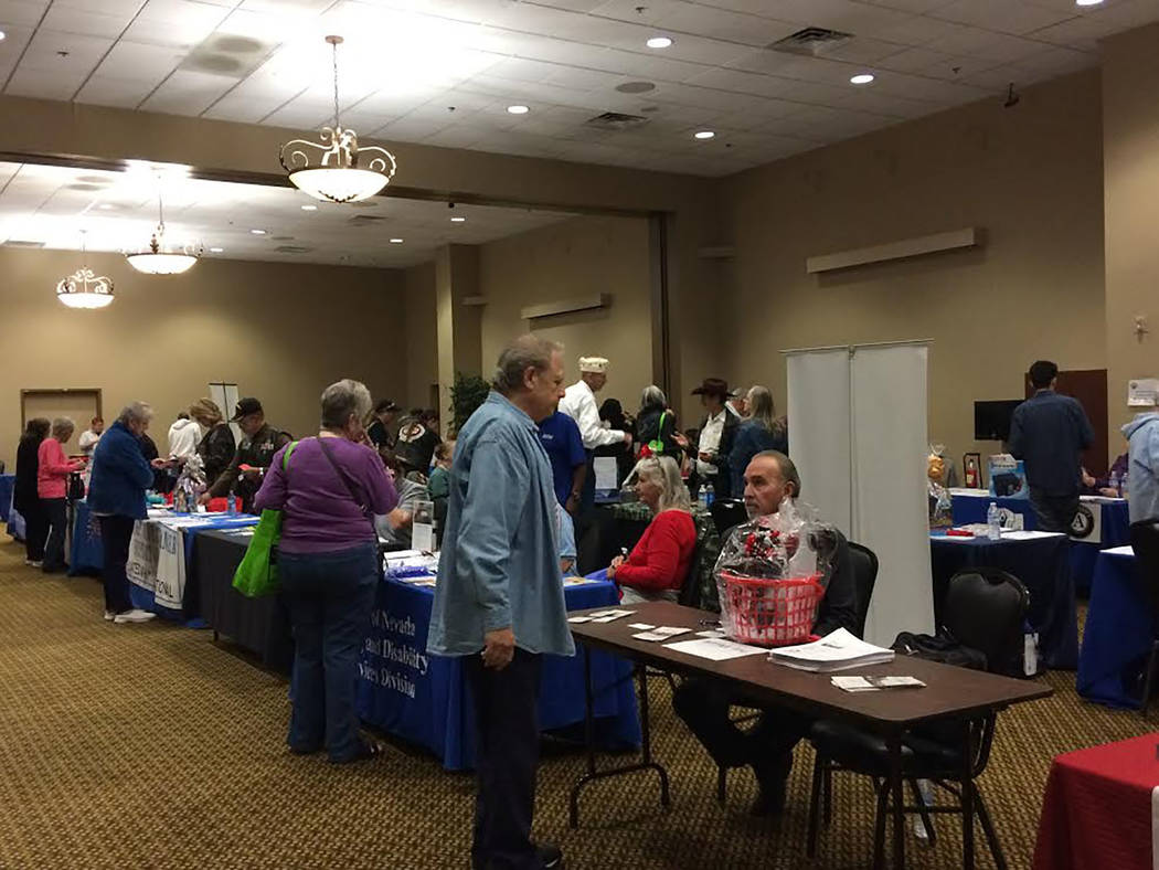 Robin Hebrock/Pahrump Valley Times This file photo shows the scene at the 3rd Annual Social Services Fair, hosted by Nye County Health and Human Services, where attendees moved from booth to booth ...