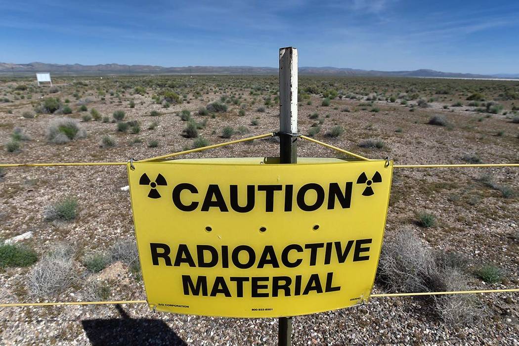 A warning sign is displayed at the Counter-Terrorism Operations Support training facility near the blast site from the 1955 Apple II nuclear bomb test at the Nevada National Security Site on Wedne ...