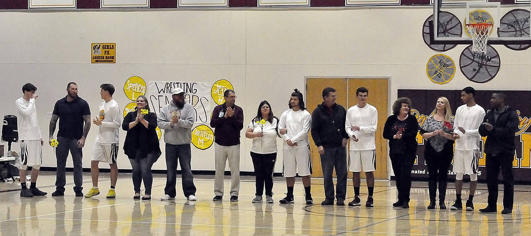 Horace Langford Jr./Pahrump Valley Times Pahrump Valley boys basketball seniors, from left, Chance Farnsworth, Brayden Severt, Eric Toomer, Garrett Ward and Ethan Whittle with their parents before ...