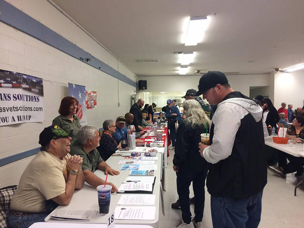 Robin Hebrock/Pahrump Valley Times This file photo shows attendees speaking with members of the American Veterans Foundation of Pahrump and Homeless Veterans Solutions, just two of the many organi ...