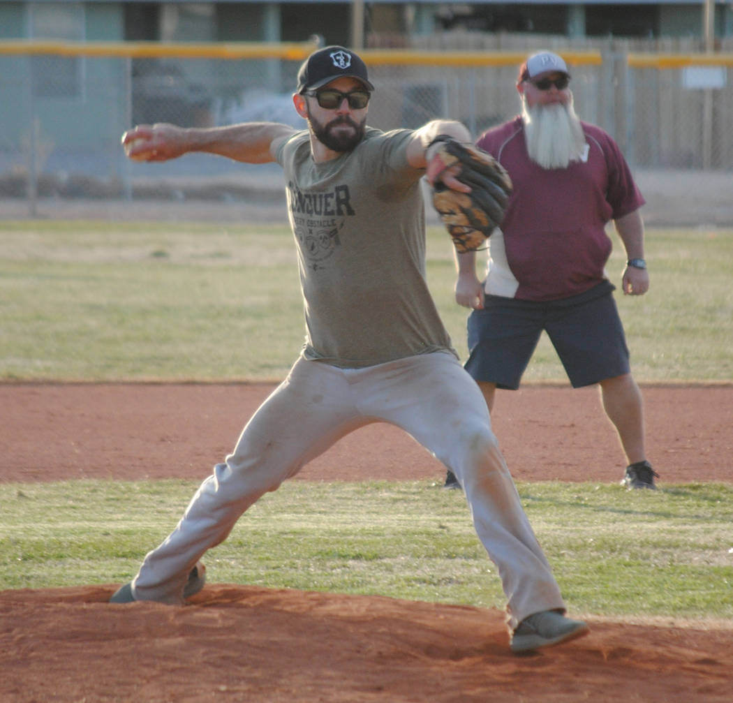 Charlotte Uyeno/Pahrump Valley Times Cody Nielsen, Class of 2008, delivers a pitch Saturday during the Maroon and Gold alumni exhibition game at Pahrump Valley High School.