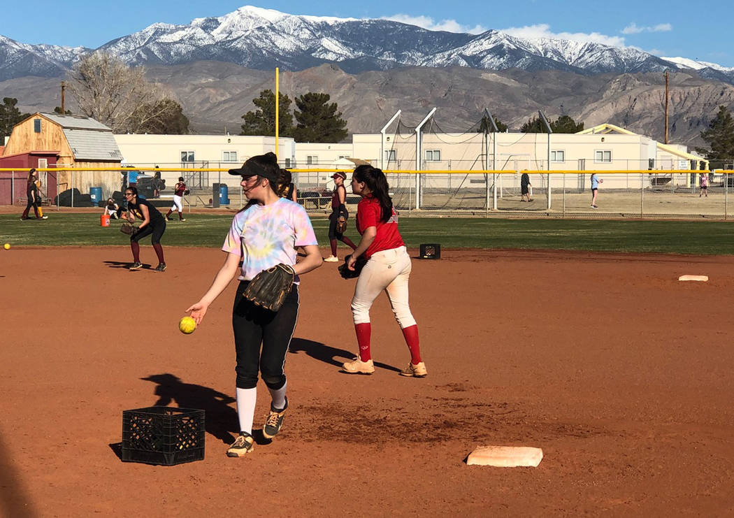 Tom Rysinski/Pahrump Valley Times Pahrump Valley High School softball players take infield practice during a Feb. 28 preseason practice at the school.