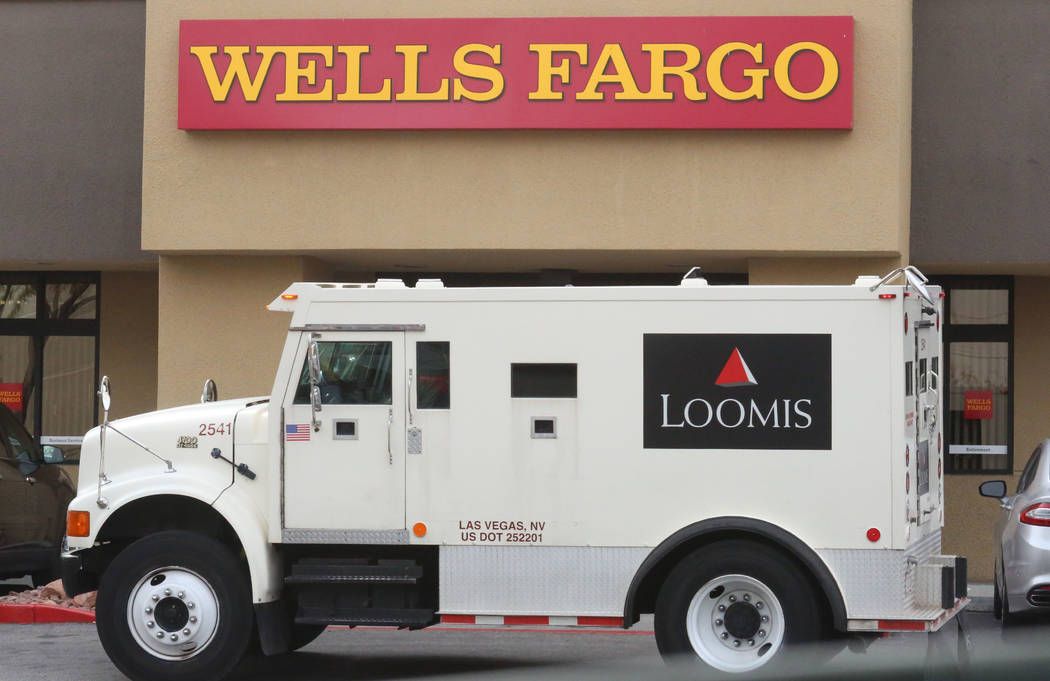 Loomis armored bank truck is parked outside a Wells Fargo branch at 1121 Las Vegas Blvd South on Tuesday, Jan. 16, 2018, in Las Vegas. (Bizuayehu Tesfaye/Las Vegas Review-Journal @bizutesfaye)