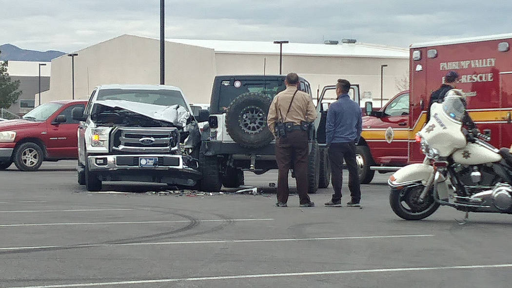 Charlotte Uyeno/Pahrump Valley Times Two Pahrump Valley High School students were transported to Desert View Hospital following a two-vehicle, high-impact collision in the student parking lot on ...