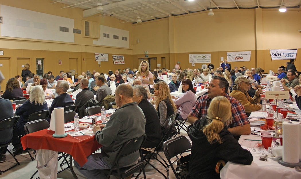 Robin Hebrock/Pahrump Valley Times The NyE Communities Coalition Activities Center was filled with patrons of this year's CASA Crab Fest.