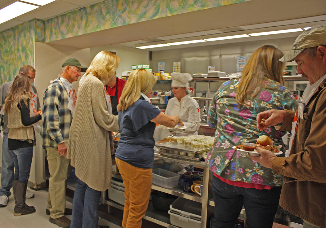 Robin Hebrock/Pahrump Valley Times Crab Fest goers line up in eager anticipation of a feast featuring not just crab but chicken and plenty of sides.