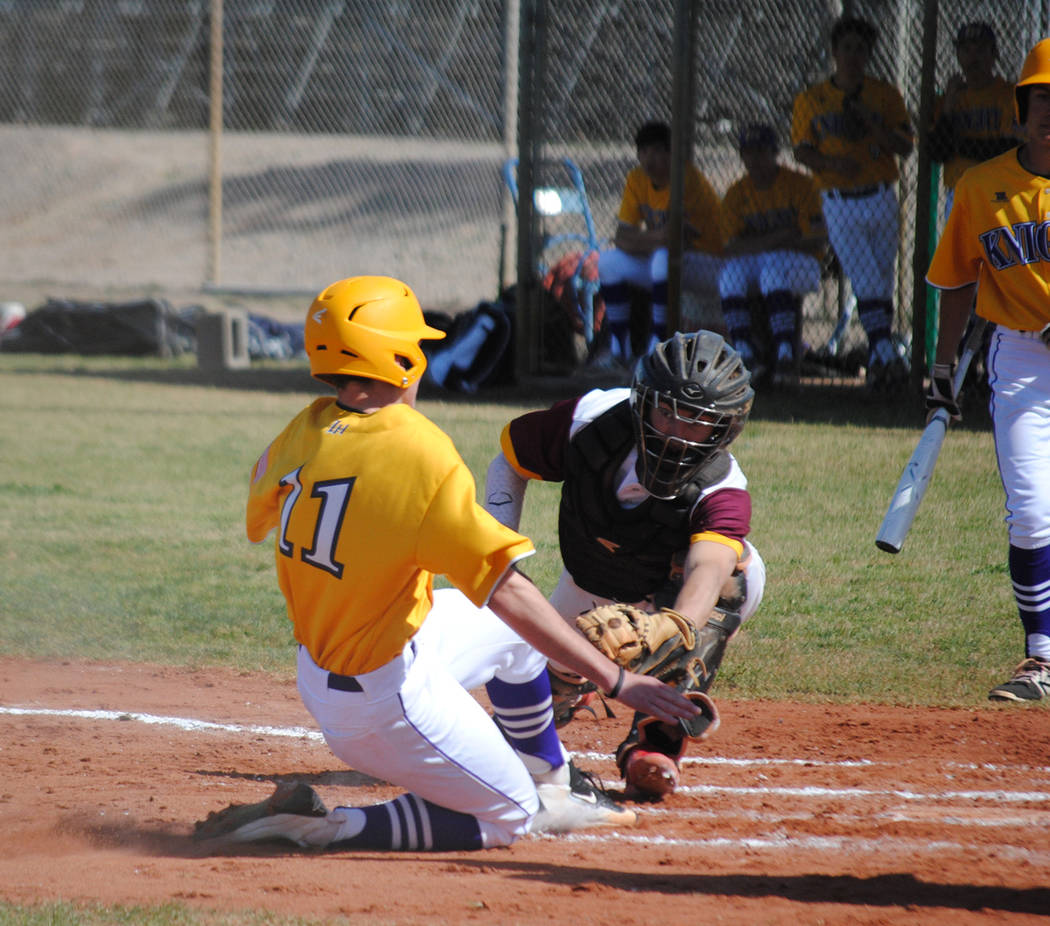 Charlotte Uyeno/Pahrump Valley Times Senior catcher Willie Lucas makes the tag at home to complete a double play on a throw from Chase McDaniel during Pahrump Valley's 12-1 win over Lake Havasu, A ...