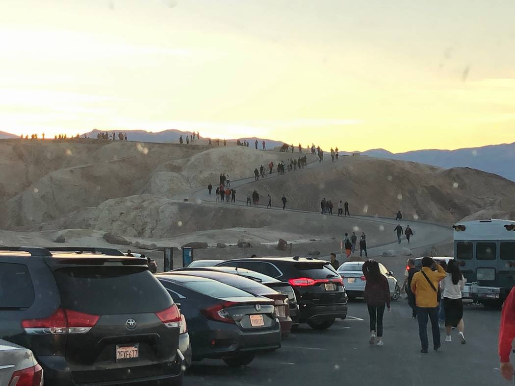 Spencer Solomon /Special to the Pahrump Valley Times Visitors make the trek up the path to the scenic view at Zabriskie Point, one of the most popular attractions in Death Valley.