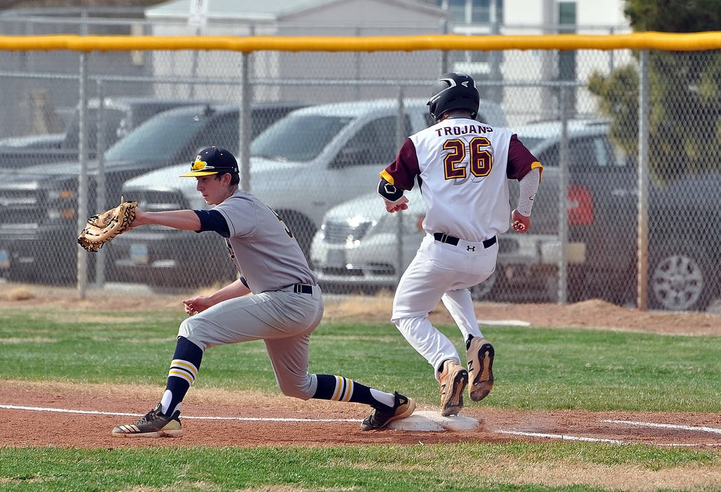 Horace Langford Jr./Pahrump Valley Times Pahrump Valley senior Tyler Floyd just missed beating out an infield single during the first inning Monday of the Trojans' 6-3 home loss to Boulder City.